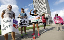 <p>Protesters representing various abortion rights groups gather across the street from the state Capitol, during a rally opposing the nomination of Judge Brett Kavanaugh to the U.S. Supreme Court, Tuesday, July 10, 2018, in Jackson, Miss. (Photo: Rogelio V. Solis/AP) </p>