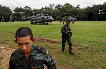 An Air Force unit works near Tham Luang cave complex, as an ongoing search for members of an under-16 soccer team and their coach continues, in the northern province of Chiang Rai, Thailand, July 1, 2018. REUTERS/Soe Zeya Tun