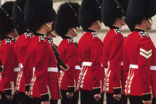 Shocking moment Queen's Guard pulls gun on tourist