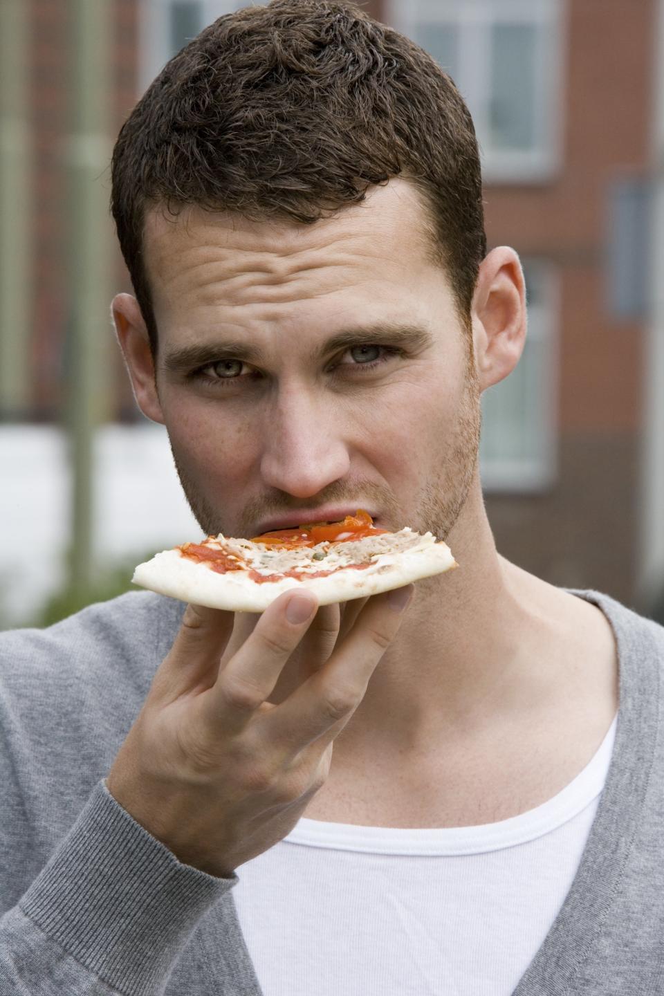 Is his smoldering gaze hotter than the slice in his hand? No, no it's not.