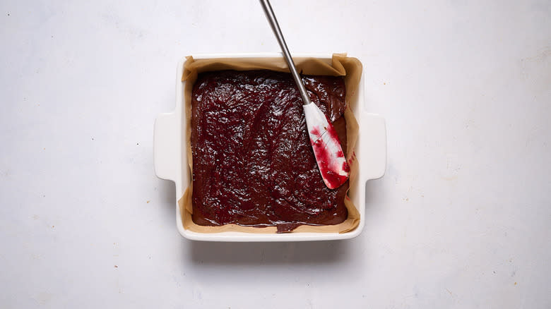 swirling raspberry with spatula