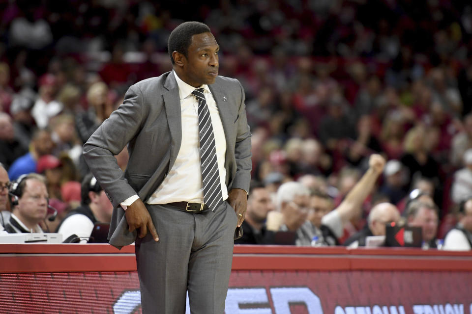 Alabama coach Avery Johnson watches the action against Arkansas during an NCAA college basketball game, Saturday, March 9, 2019 in Fayetteville, Ark. (AP Photo/Michael Woods)