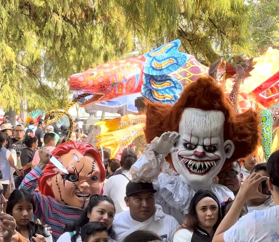 Dia de los Muertos festivities in Mexico City feature Hollywood horror movie images and costumes typically reserved for Halloween. Mathew Sandoval photo, <a href="http://creativecommons.org/licenses/by/4.0/" rel="nofollow noopener" target="_blank" data-ylk="slk:CC BY;elm:context_link;itc:0;sec:content-canvas" class="link ">CC BY</a>