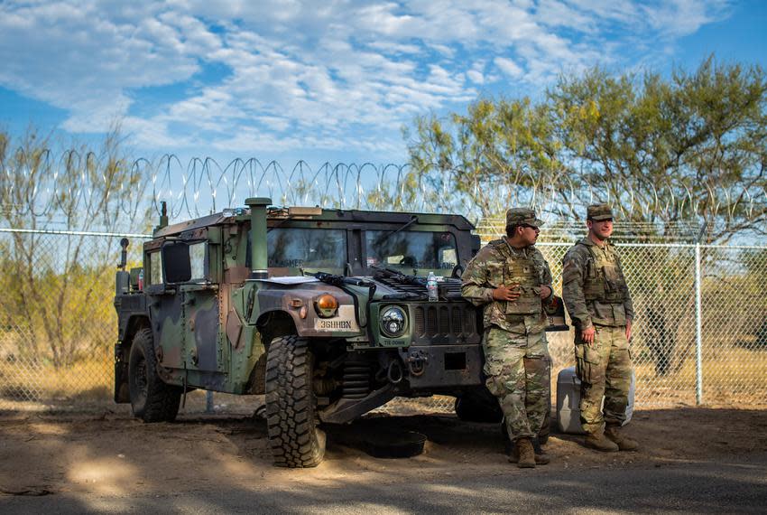 Members of the Texas National Guard, seen here on Dec. 8, work 12- to 13-hour shifts guarding the Texas border wall, construction crews and materials near Del Rio. Thousands of National Guard troops were deployed to Del Rio after an increase in migration at the southern border.