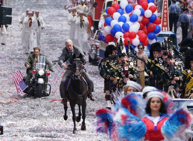 A body double for Harrison Ford seen on a horse during filming in Glasgow