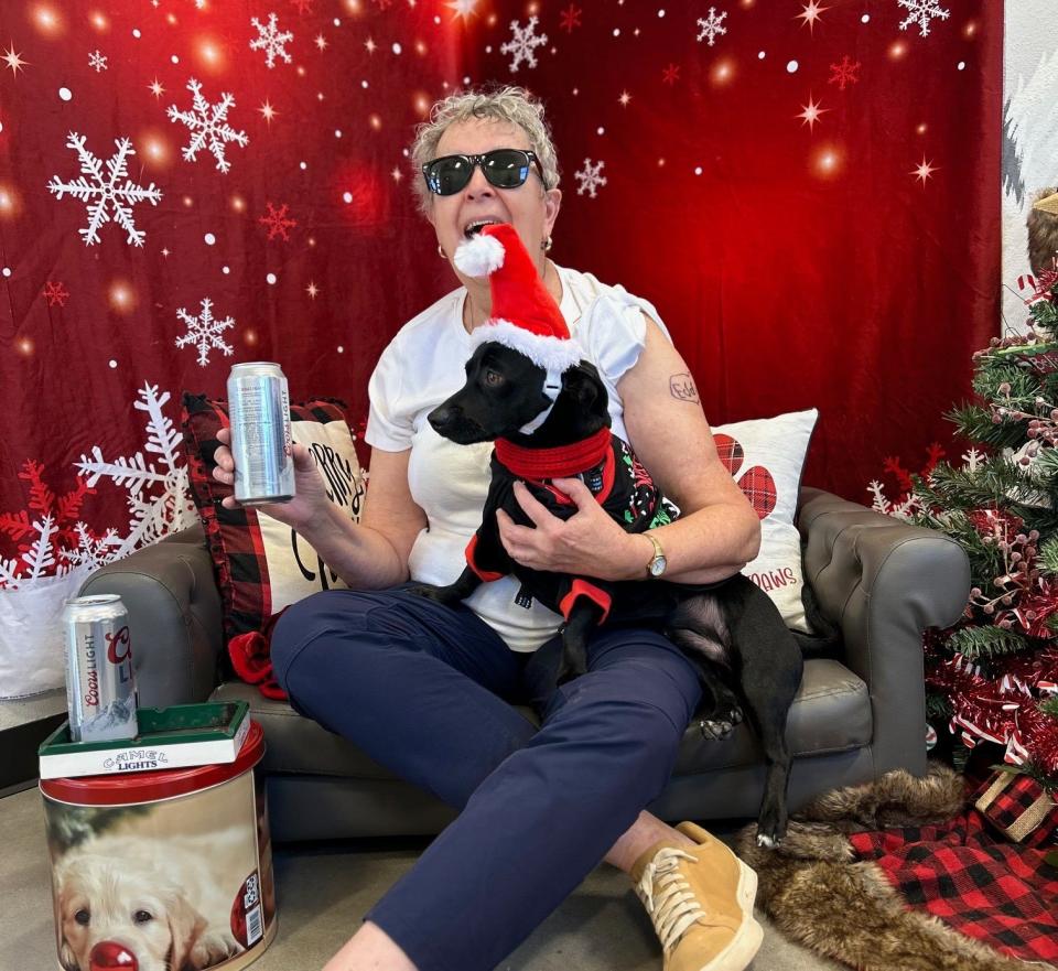 Animal lover Liz Vernon had a Christmas photo taken in a fundraiser with "Ahole Eddie," the dachshund mix whose spitfire qualities were famously detailed in a Nov. 16 Facebook post by the Humane Society of Wichita County. Within hours, Eddie found a forever home with a Cleburne family.