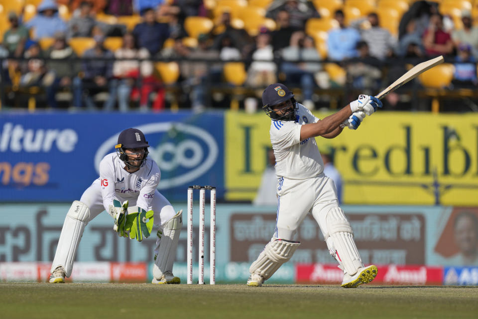 India's captain Rohit Sharma plays a shot on the first day of the fifth and final test match between England and India in Dharamshala, India, Thursday, March 7, 2024. (AP Photo/Ashwini Bhatia)