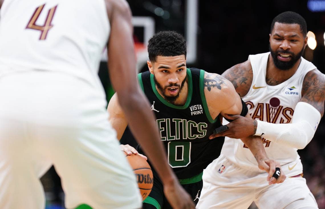 Boston Celtics forward Jayson Tatum (0) drivers the ball against Cleveland Cavaliers forward Marcus Morris Sr. (24) in the third quarter during Game 5 of the second round for the 2024 NBA playoffs at TD Garden on May 15, 2024.