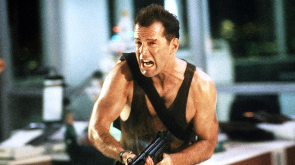 Bruce Willis screaming and running with a gun in Die Hard