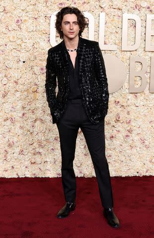 <p>Amy Sussman/Getty</p> Timothee Chalamet attend the 81st Annual Golden Globe Awards at The Beverly Hilton on January 07, 2024 in Beverly Hills, California