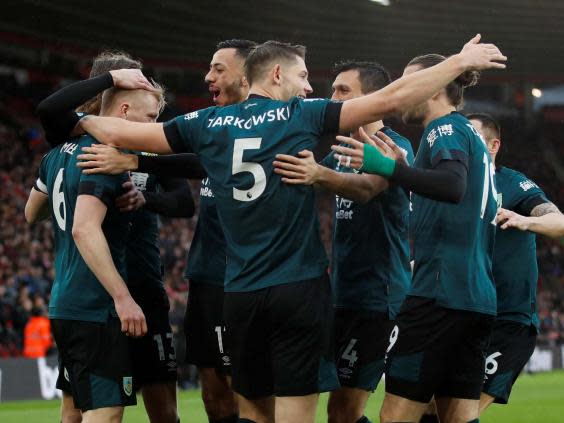 Burnley celebrate after Ashley Westwood scores just 93 seconds into the match (Reuters)