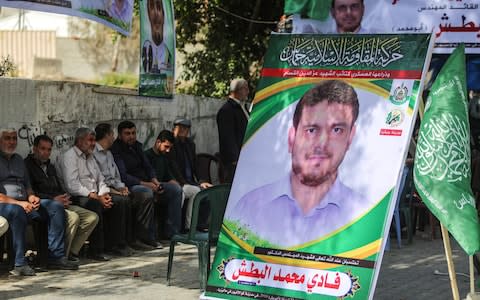 Palestinians attend a memorial ceremony for Fadi al-Batsh - Credit: Ali Jadallah/Anadolu Agency/Getty Images