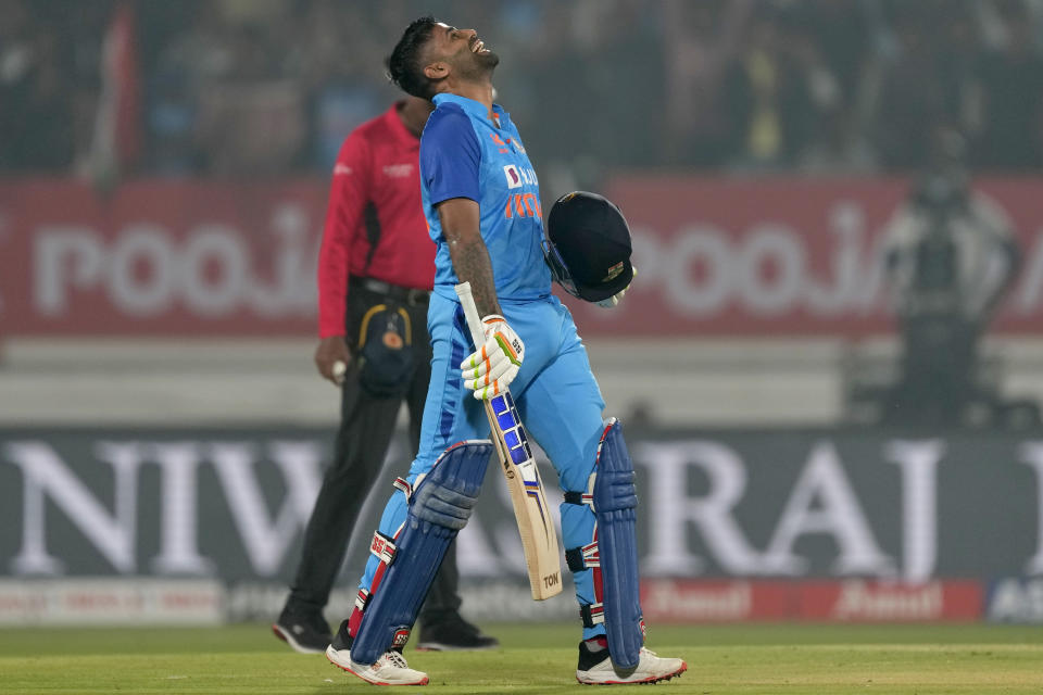 India's Suryakumar Yadav reacts after scoring century during the third T20 cricket match between India and Sri Lanka, in Rajkot, India, Saturday, Jan. 7, 2023. (AP Photo/Ajit Solanki)