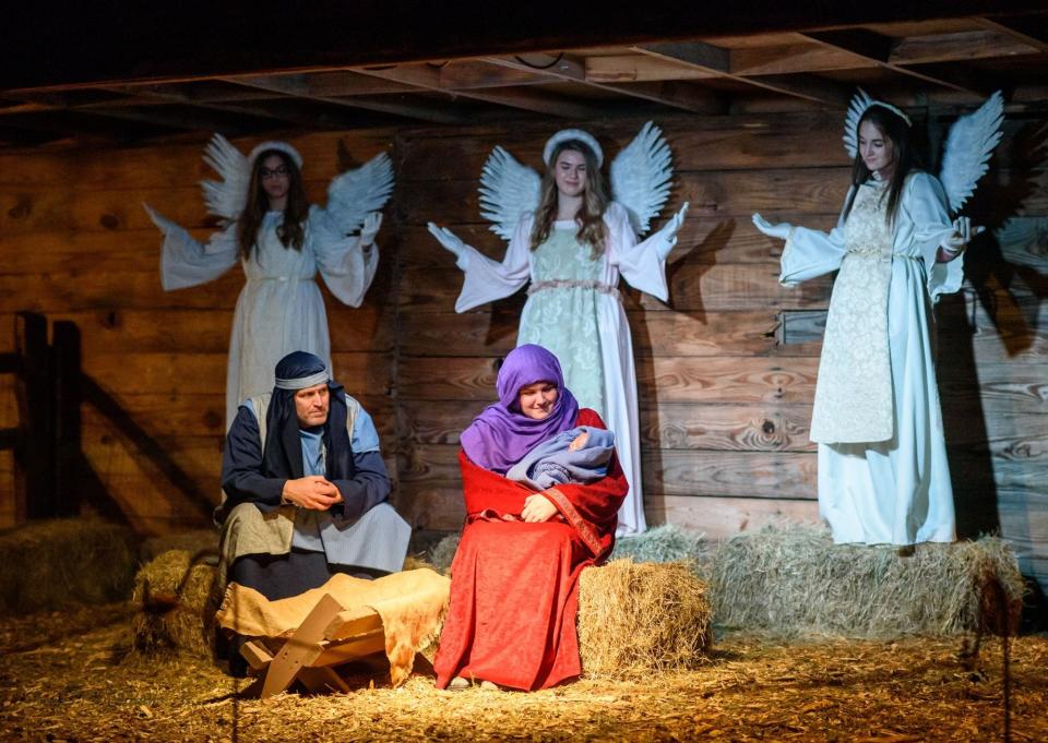 FILE - Grace United Methodist Church volunteers portray Jesus, Mary, Joseph and angels during "Return to Bethlehem" in North Augusta. This year marks 25 years since the church started this tradition.
