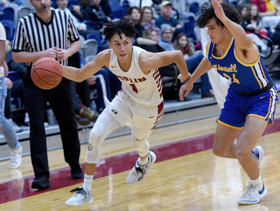 Joplin’s Always Wright works to get around Francis Howell’s Jude James during their semifinal game of the Kaminsky Classic in 2022 at Joplin High School in Missouri.