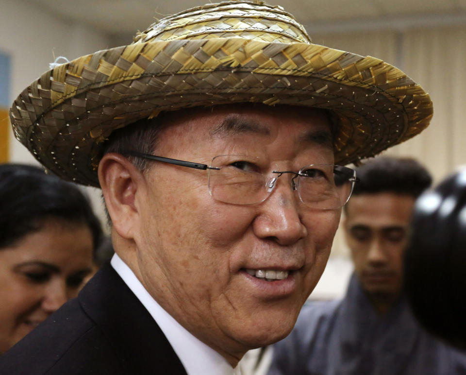 U.N. Secretary-General Ban Ki-moon wears a hat given to him by a student during his visit to Cuba's Latin American School of Medicine (ELAM) in Havana, Cuba, Tuesday, Jan. 28, 2014. On Tuesday, Fidel Castro met with Ban Ki-moon during which they discussed a "wide range of topics," Ban's office tweeted. Ban Ki-moon is in Cuba for the summit of the Community of Latin American and Caribbean States, or CELAC. (AP Photo/Desmond Boylan)