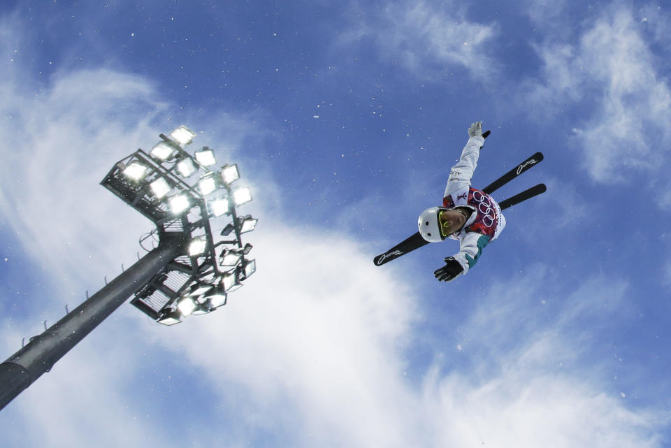 Australia's Lydia Lassila jumps during women's freestyle skiing aerials training at the Rosa Khutor Extreme Park, at the 2014 Winter Olympics, Friday, Feb. 14, 2014, in Krasnaya Polyana, Russia. (AP Photo/Greg Baker)