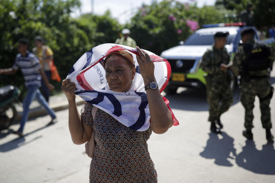 Neighbors of Luis Manuel Díaz wait for his arrival outside his home in Barrancas, Colombia, after he was released by his kidnappers, Thursday, Nov. 9, 2023. Díaz, the father of Liverpool striker Luis Díaz, was kidnapped on Oct. 28 by the guerrilla group National Liberation Army, or ELN. (AP Photo/Ivan Valencia)