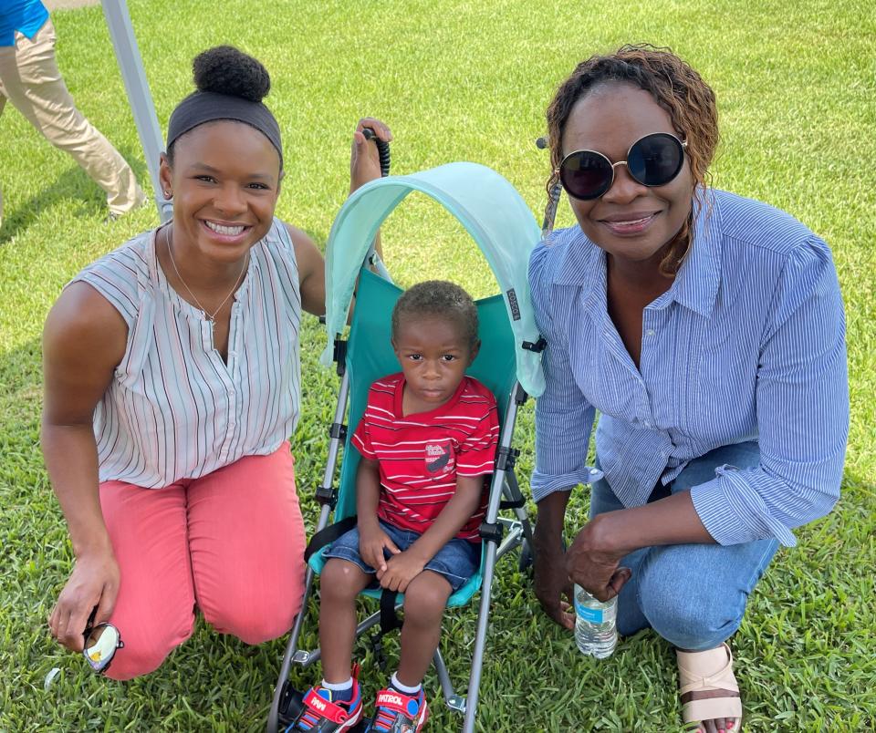 U.S. Army vet, Afghanistan, Roxanne Allen with her son, Judah, 2, and her mother, Shirley Cooke, at the annual Earl Hodges Memorial Day celebration in Naples on Monday, May 29, 2023.