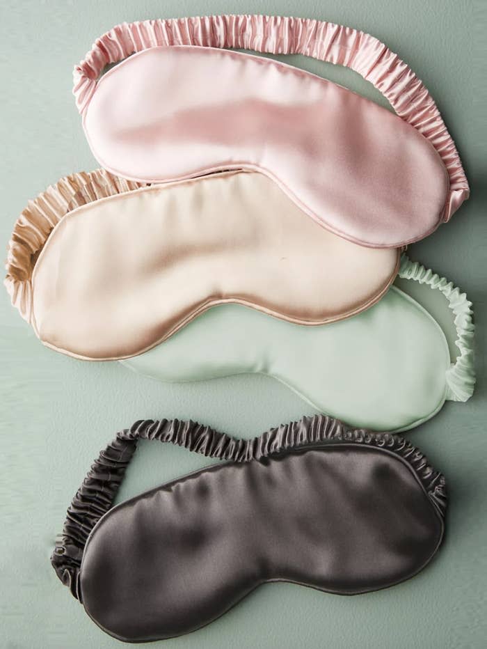 the pink, beige, mint, and black eye masks