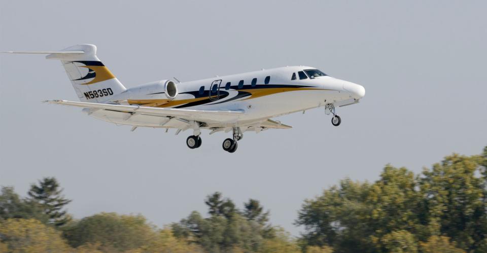 A jet in flight shortly after take off at the Manitowoc County Airport, Tuesday, October 11, 2022, in Manitowoc, Wis.