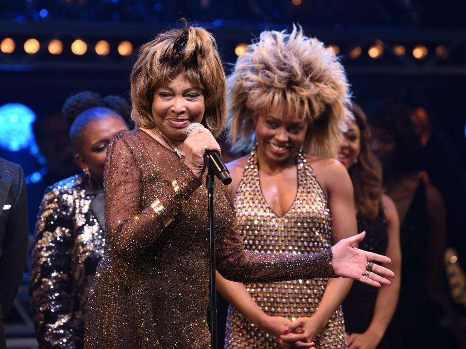 Singer Tina Turner, left, speaks on stage with actress Adrienne Warren on the opening night of "Tina – The Tina Turner Musical" at the Lunt-Fontanne Theatre on Thursday, Nov. 7, 2019, in New York.
