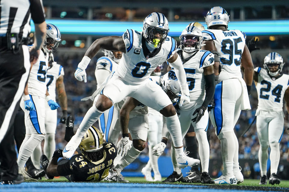 Carolina Panthers linebacker Brian Burns celebrates during the second half of an NFL football game against the New Orleans Saints Monday, Sept. 18, 2023, in Charlotte, N.C. (AP Photo/Jacob Kupferman)