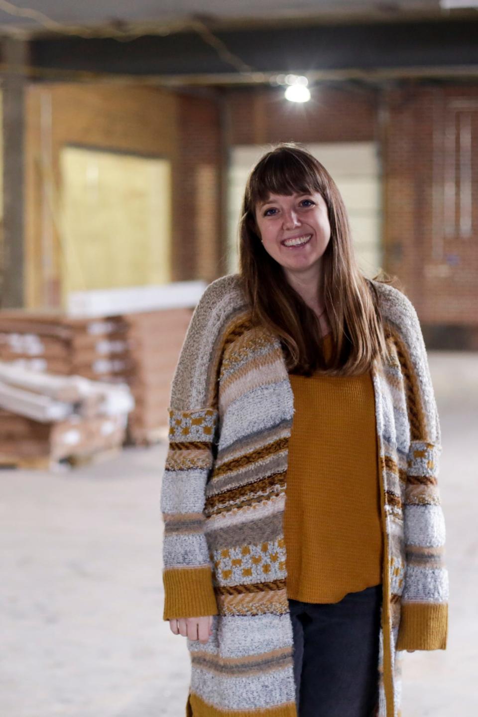 Brittany Whitenack, founder and CEO of Antique Candle Co., stands inside their new office location, 1611 Schuyler Ave., Tuesday, Nov. 24, 2020 in Lafayette.