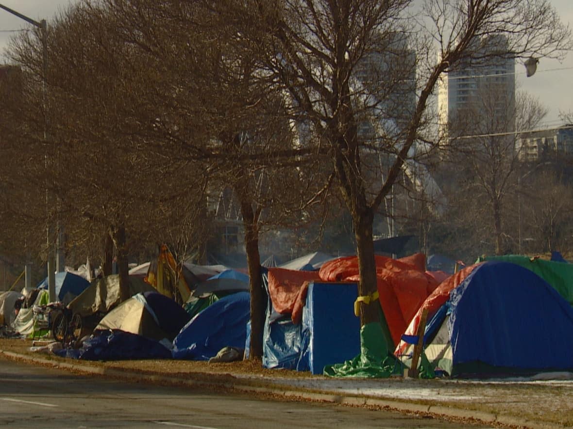 Camp Pekiwewin started in the summer of 2020, before the city shut it down in the fall, and moved people to the Edmonton Convention Centre. (Travis McEwan/CBC - image credit)