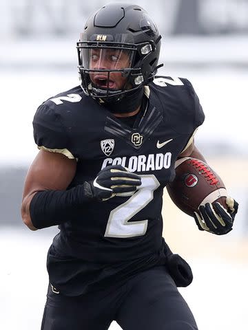 <p>Matthew Stockman/Getty</p> Jerry Rice's son Brenden Rice of the Colorado Buffaloes at Folsom Field on Dec. 12, 2020 in Boulder, Colorado