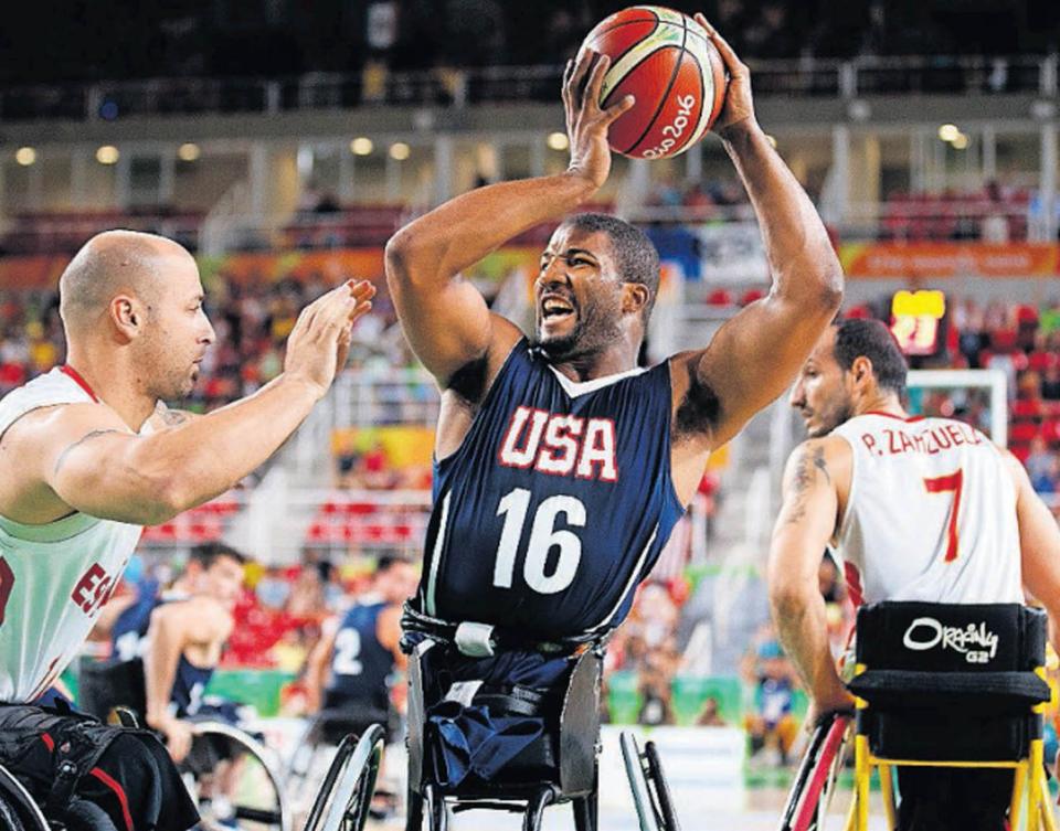 Team USA player Trevon Jenifer, an Edinboro University graduate, tries to keep the ball away from a Spain player during the men's wheelchair basketball final during the 2016 Paralympic Games at Rio de Janeiro, Brazil. The Americans won and were gold medalists. Last month, Jenifer helped Team USA beat Great Britain in the final of the International Wheelchair Basketball Federation World Championships at Dubai, United Arab Emirates.