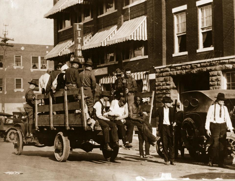 Injured and wounded prisoners are taken to hospital under guard after the Tulsa, Oklahoma race riots in 1921 when up to 300 African-Americans were massacred by white mobs: AFP/Getty Images