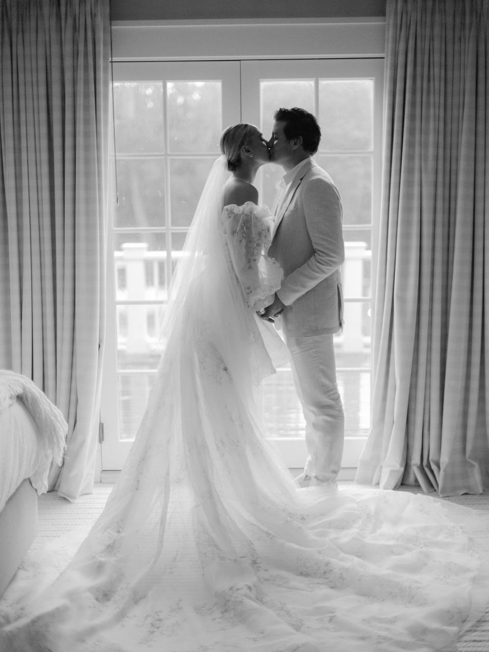 The Bride and Groom Said Their Vows Beneath a Floral Chuppah at This Hamptons Backyard Wedding