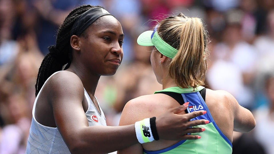 Coco Gauff hugs Sofia Kenin at the net following their Women's Singles fourth round match on day seven of the 2020 Australian Open at Melbourne Park on January 26, 2020 in Melbourne, Australia. (Photo by Quinn Rooney/Getty Images)