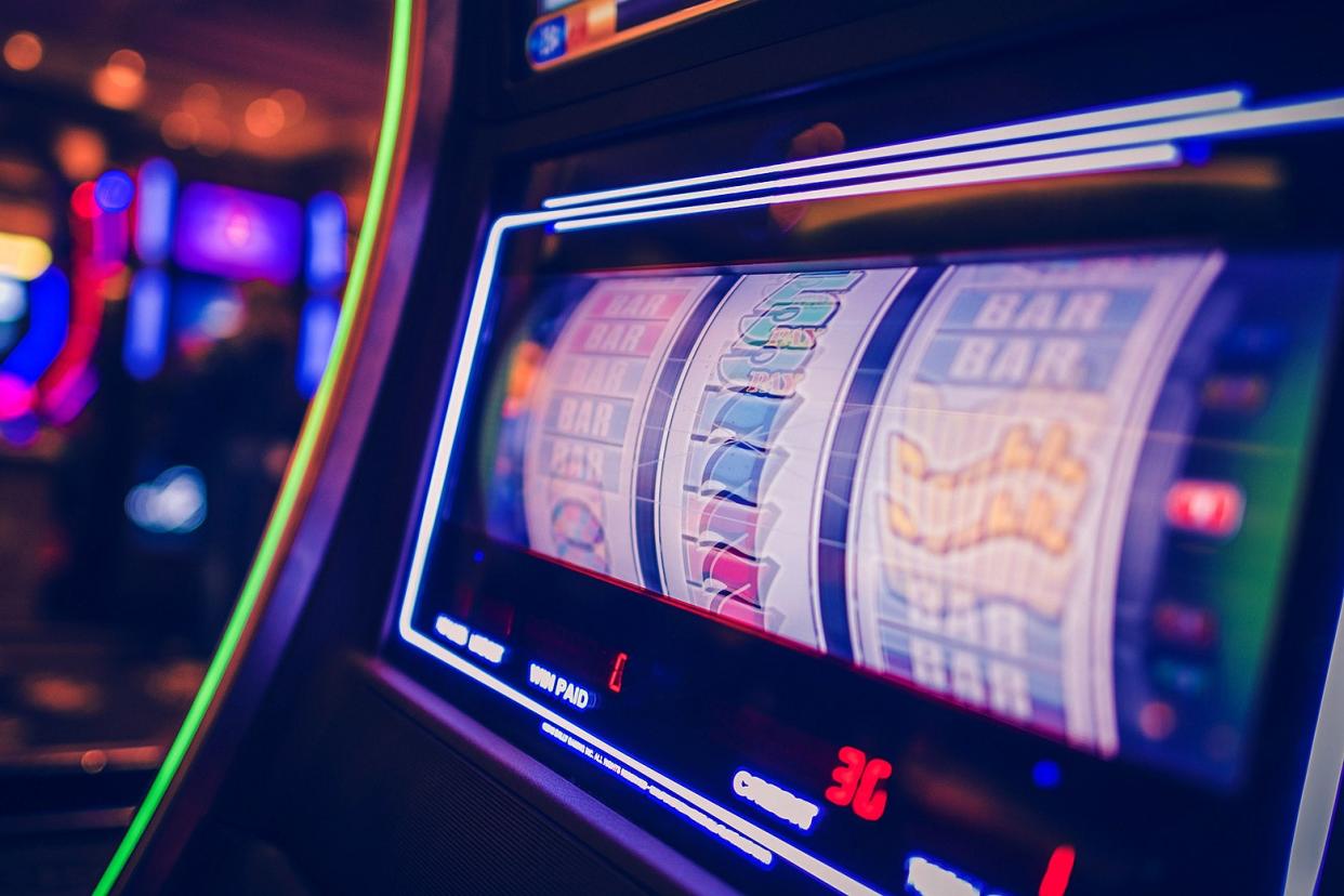 A Vegas slot machine spinning.