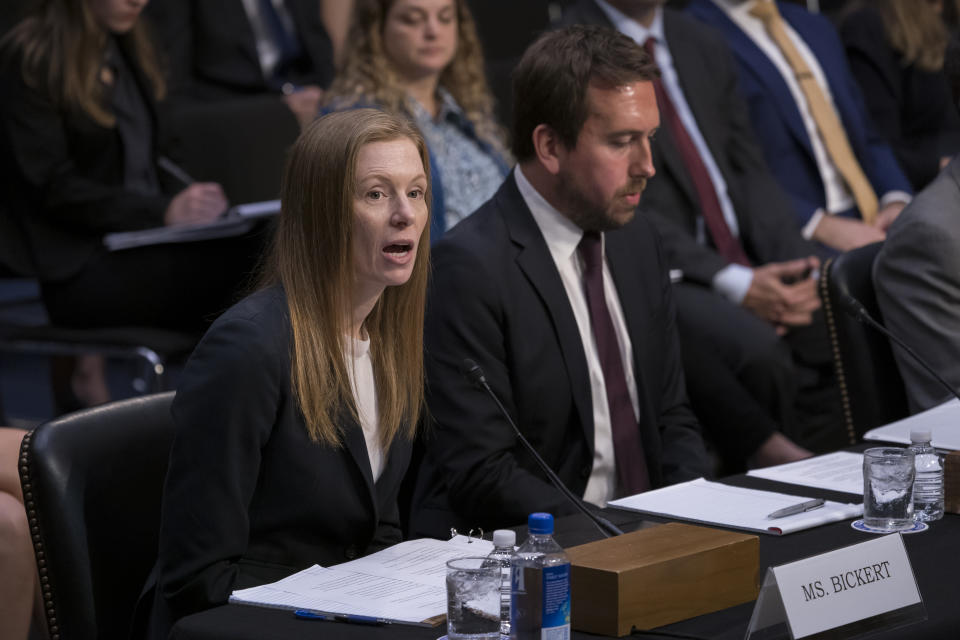 Monika Bickert, head of global policy management at Facebook, joined at right by Nick Pickles, public policy director for Twitter, testifies before the Senate Commerce, Science and Transportation Committee during a hearing on how internet and social media companies are prepared to thwart terrorism and extremism, Wednesday, Sept. 18, 2019, on Capitol Hill in Washington. (AP Photo/J. Scott Applewhite)