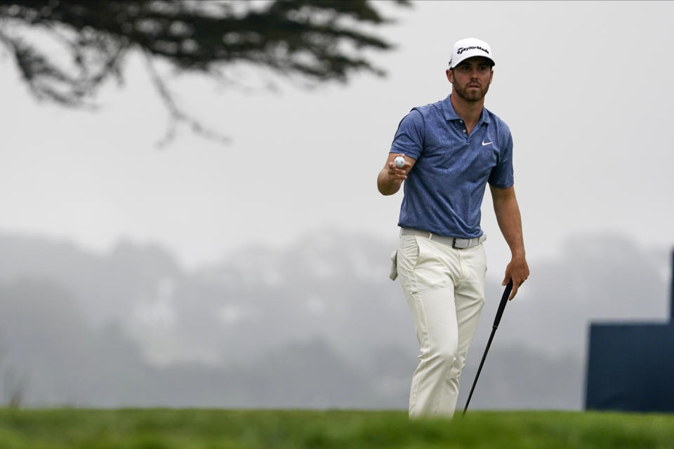 Matt Wolff celebrates after a birdie on the 17th hole during the final round of the PGA Championship golf tournament at TPC Harding Park Sunday, Aug. 9, 2020, in San Francisco. (AP Photo/Charlie Riedel)