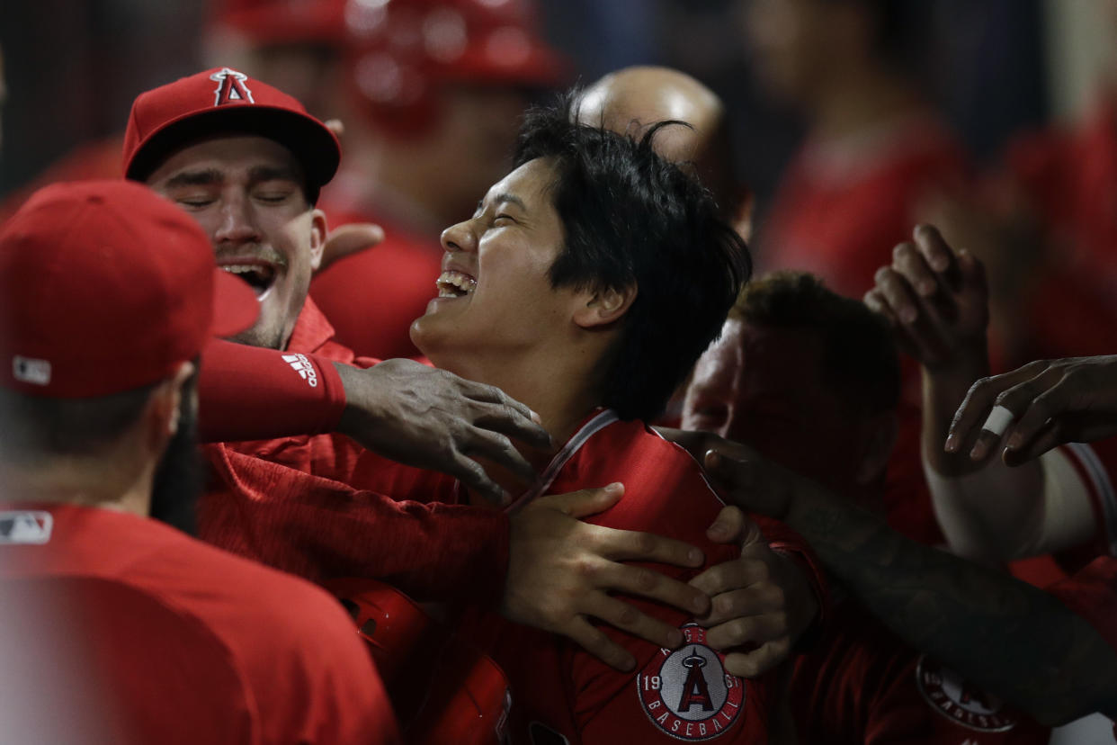 Angels rookie Shohei Ohtani celebrates his first home run in the majors. (AP)