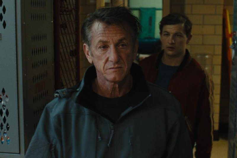Gene (Sean Penn, L) shows Ollie (Tye Sheridan) the ropes. Photo courtesy of Vertical/Roadside Attractions