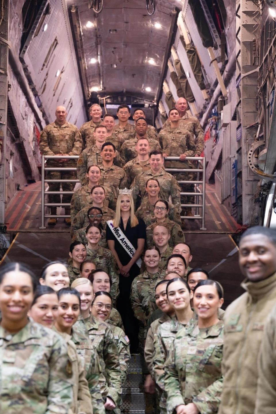 US Air Force 2nd Lt. Madison Marsh poses with airmen