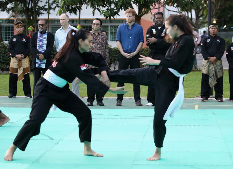 SINGAPORE - JUNE 04: Prince Harry watches a martial arts demonstration at Jamiyah Singapore on the first day of a two day visit to Singapore on June 4, 2017 in Singapore. (Photo by Chris Jackson/Getty Images)