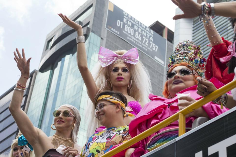 Revelers ride a float during the gay pride parade, in Mexico City, Saturday, Jun. 29, 2019. (AP Photo/Christian Palma)
