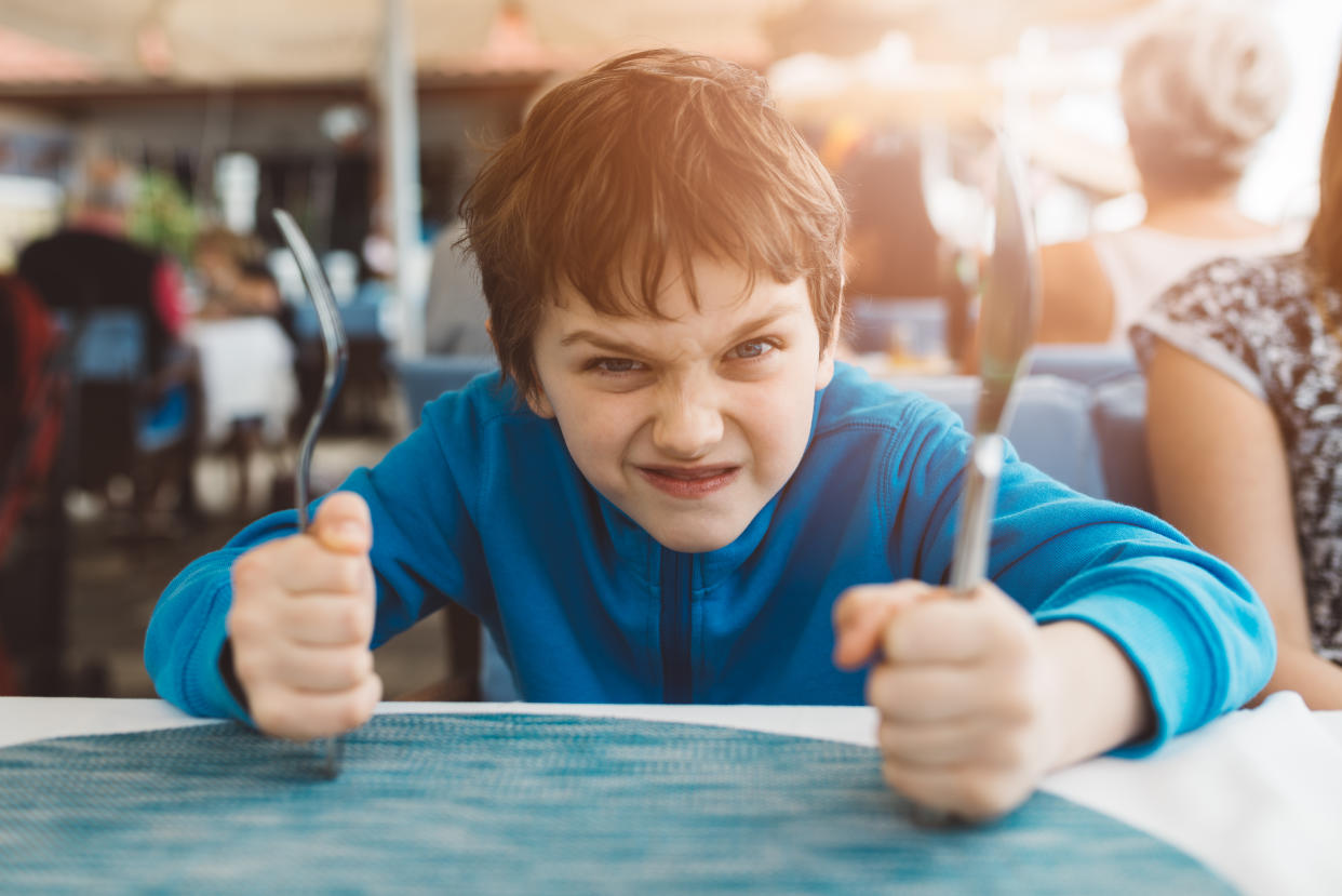 A restaurant has sparked controversy after issuing a notice to families asking them to keep children quiet [Photo: Getty]