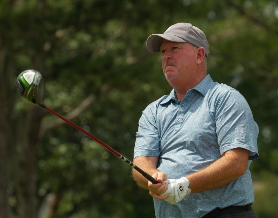 Brian Armstrong, who won the Championship Flight on Sunday with partner Gary Cona, watches his tee shot on the first hole during the final round of the 57th annual 4-Ball Invitational at Cleveland Heights Golf Course on Sunday, March 26, 2023.