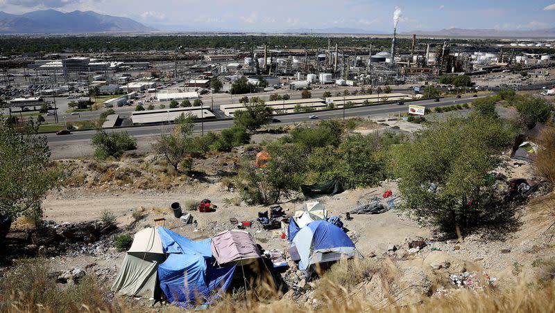 Homeless camps overlook Victory Road in Salt Lake City. The City Council voted Tuesday to approve a new process to establish homeless resource centers in the city.