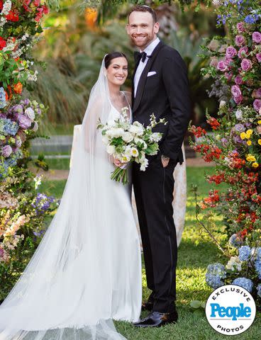 <p>ALEXA COLLINS, DUDETTE PHOTOGRAPHY</p> CNN's Elizabeth Wagmeister marries Michael Sigall on March 17 in Los Cabos.