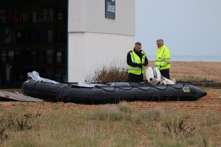 Britain's Border Force inspect an intercepted migrant dinghy off the Kent coast, Britain December 31, 2018 in this picture obtained from social media. Twitter/Susan Pilcher via REUTERS