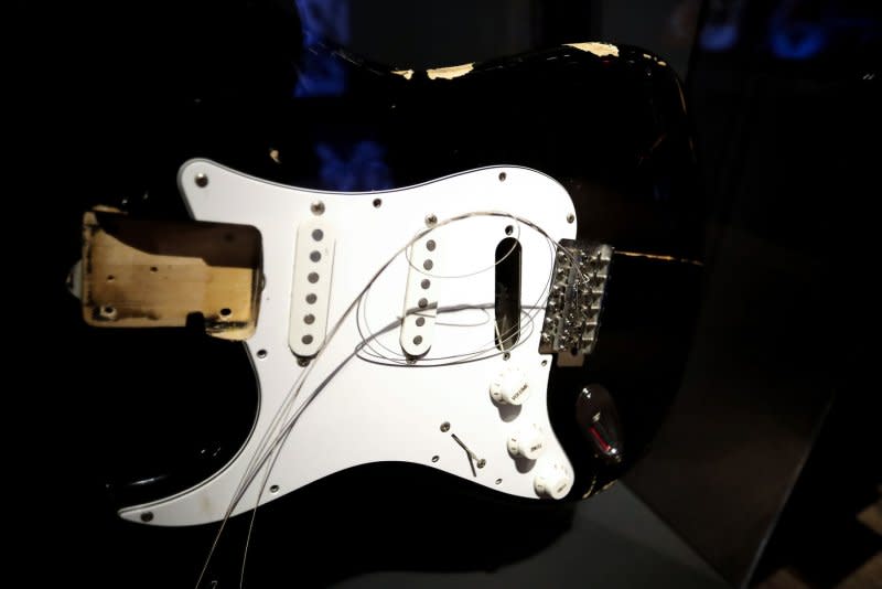 A Stratocaster once owned by Kurt Cobain is on display at a press preview for "Play It Loud: Instruments of Rock & Roll" at the Metropolitan Museum of Art on April 1. On April 5, 1994, Cobain killed himself at his home in Seattle. He was 27. It would be three days before his body was discovered. Photo by John Angelillo/UPI