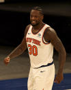 New York Knicks' Julius Randle celebrates his basket in the second half against the Indiana Pacers during an NBA basketball game Saturday, Feb. 27, 2021, in New York. (Elsa/Pool Photo via AP)