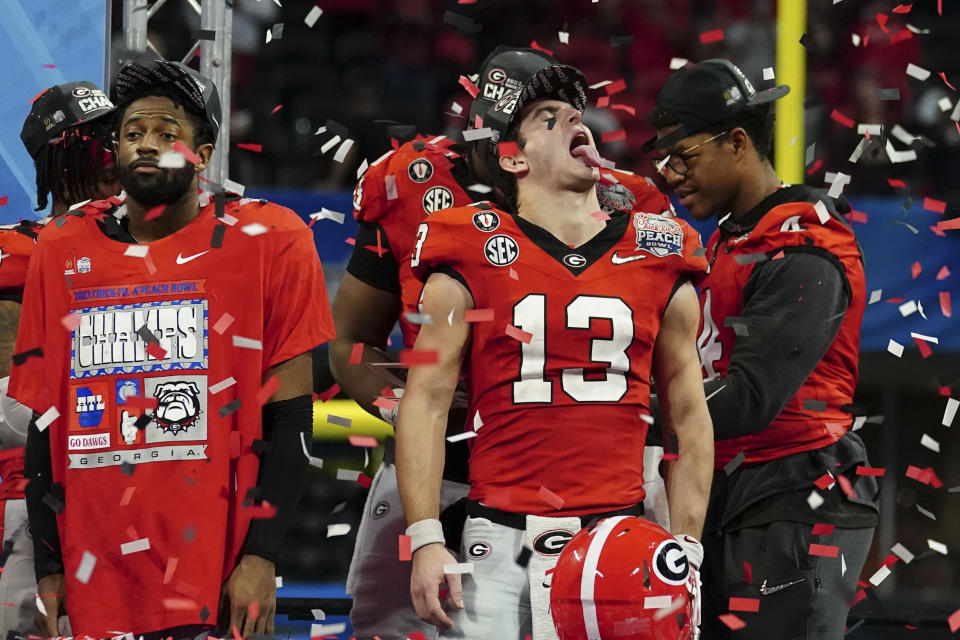 Georgia quarterback Stetson Bennett celebrates after the Peach Bowl NCAA college football semifinal playoff game between Georgia and Ohio State, Sunday, Jan. 1, 2023, in Atlanta. Georgia won 42-41. (AP Photo/John Bazemore)